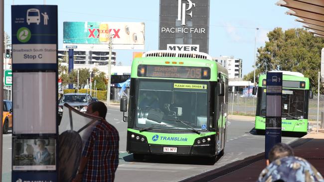 Passengers wait at a bus stop on the Gold Coast. Picture Glenn Hampson