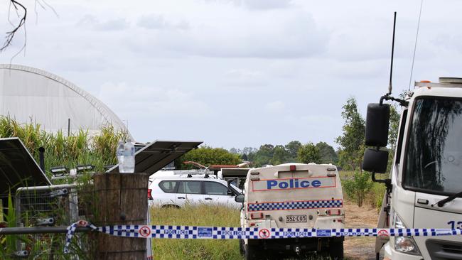 Police crews investigate the death of a woman at an Undullah Rd property Woodhill. Picture: David Clark