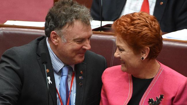 When things were rosy: Rodney Culleton and Pauline Hanson have a heart-to-heart. (Pic: AAP Image/Mick Tsikas)