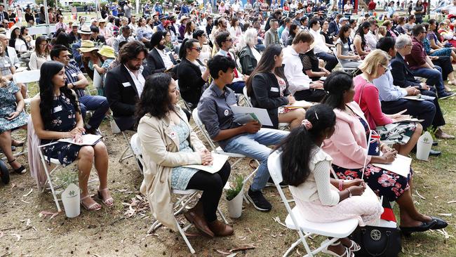 New Australian citizens celebrate Australia Day at a ceremony at Sandy Bay in 2021. Such ceremonies can be a joyous occasion but more recently the date of Australia Day has become controversial. Picture: Zak Simmonds