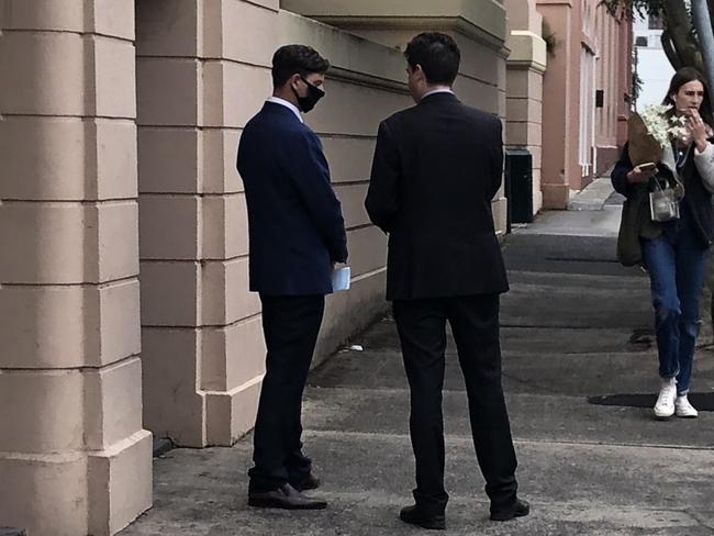 Max Cleary, left, leaving Newtown Local Court with his lawyer. The Manly landscaper and son of ex-Sea Eagle CEO Tim Cleary has been charged with rape after meeting a woman on social media.