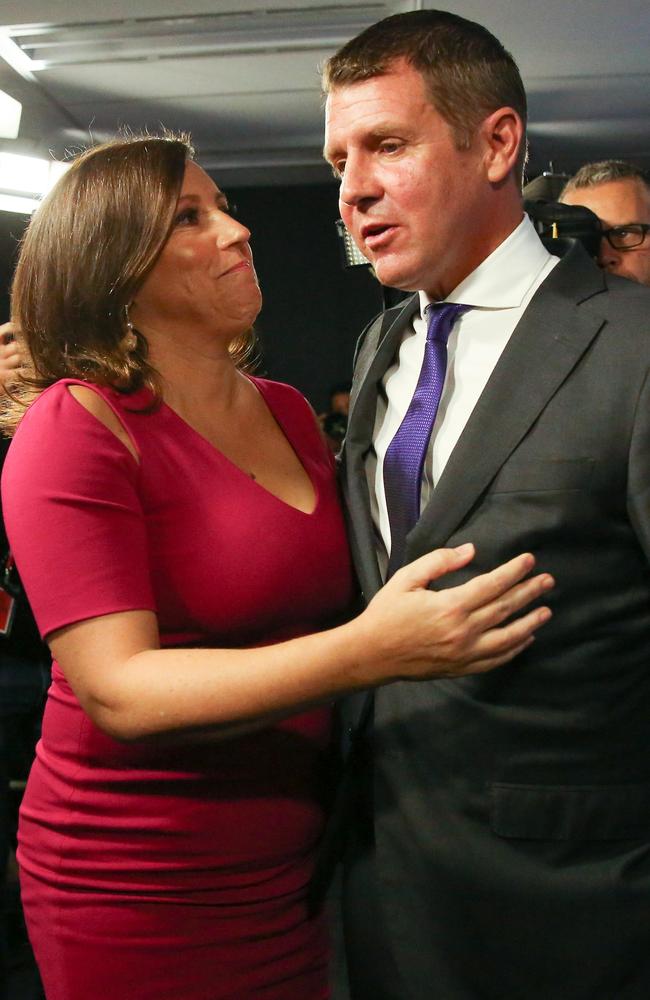 Baird is hugged by wife Kerryn after his press conference today at his Martin Place office. Picture: Ryan Osland