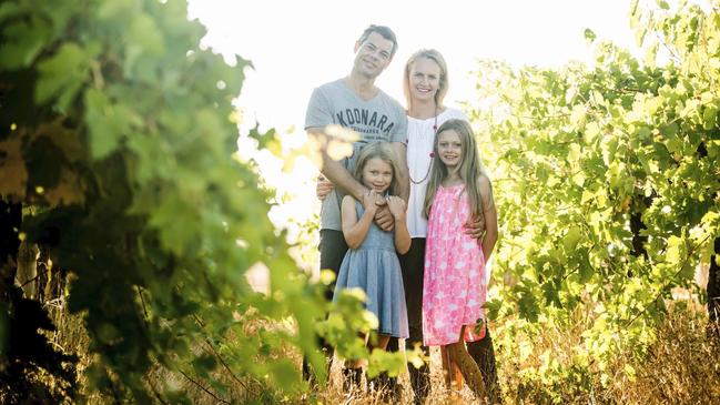 Koonara Wines’ Dru and Nicole Reschke with their daughters. Their vineyard Ambriel’s Gift at Coonawarra, SA, is a finalist in the Vineyard of the Year Awards.