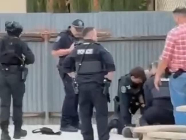 A 41-year-old man is behind bars, accused of a terrifying armed robbery at a Thebarton bottle shop. Heavily armed police swooped on the suspect, allegedly wielding a sword, hiding in a Seaton backyard. Picture; 7NEWS
