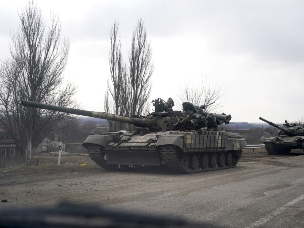 Pro-Russian separatists are seen with their armoured vehicles as civilians trapped in Mariupol city under Russian attacks.