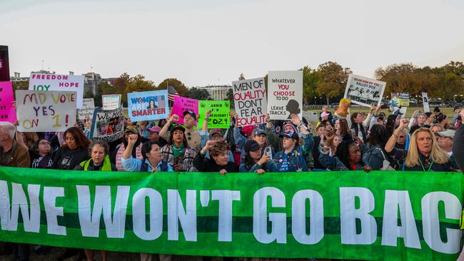 People participate in the National Women's March in Washington, DC, on November 2. Picture: Amid Farahi/AFP