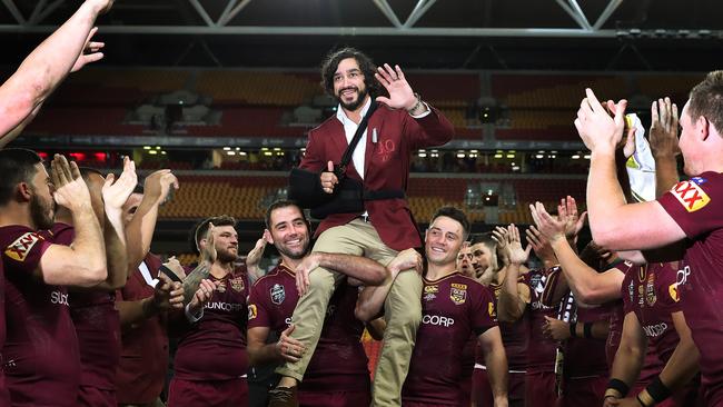 Johnathan Thurston is chaired off after Game 3. Picture: Brett Costello