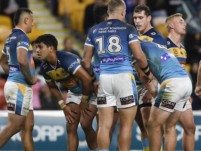 BRISBANE, AUSTRALIA - MAY 16: Titans players look dejected during the round 10 NRL match between the Gold Coast Titans and the Penrith Panthers at Suncorp Stadium, on May 16, 2021, in Brisbane, Australia. (Photo by Albert Perez/Getty Images)