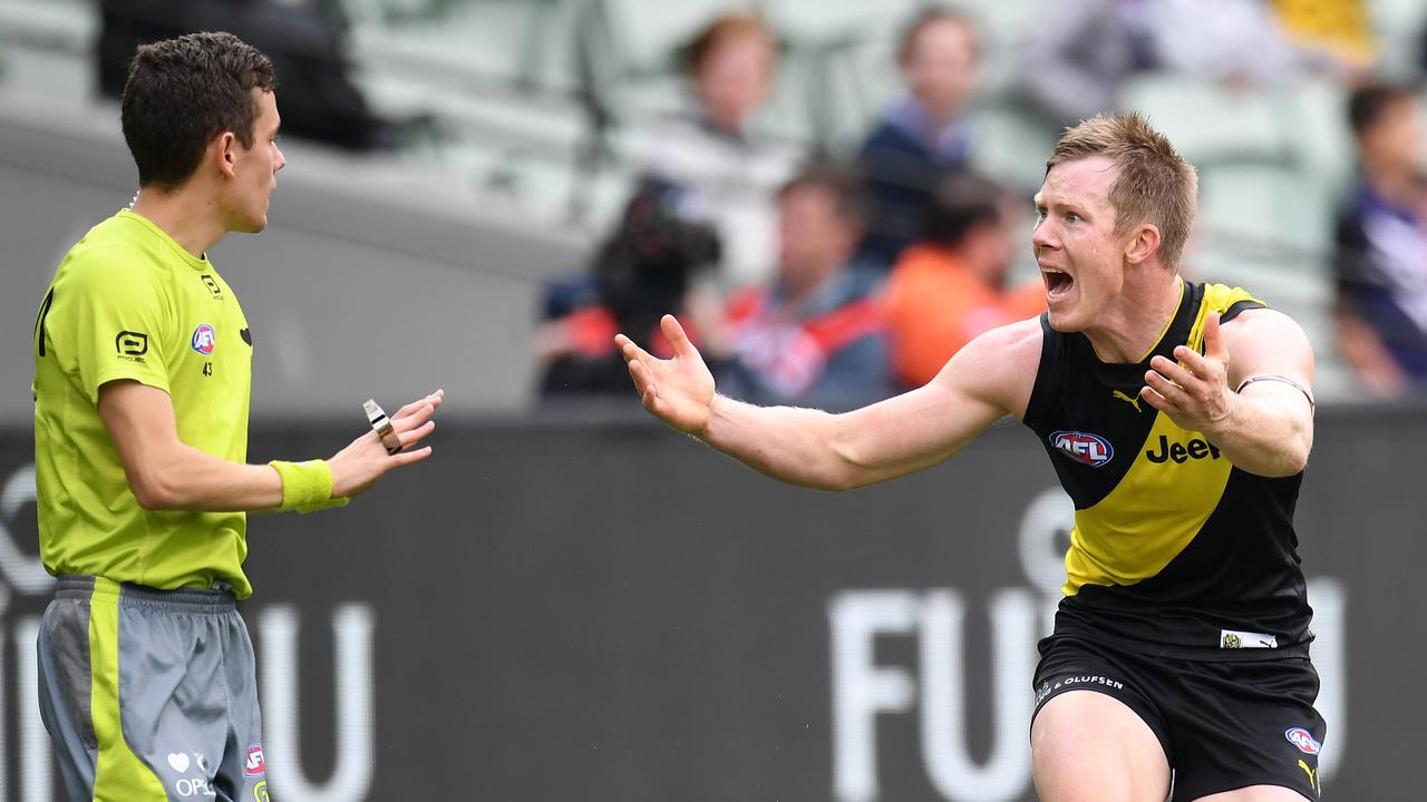 The AFL is set to take a dim view of players communicating aggressively with umpires this season. Picture: AAP Image/Julian Smith