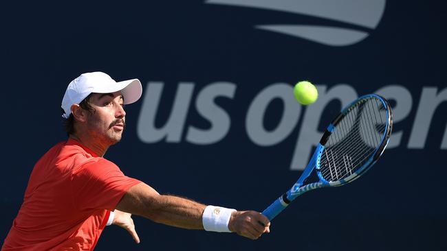 Jordan Thompson plays a backhand return against Matteo Berrettini. Picture: Getty Images