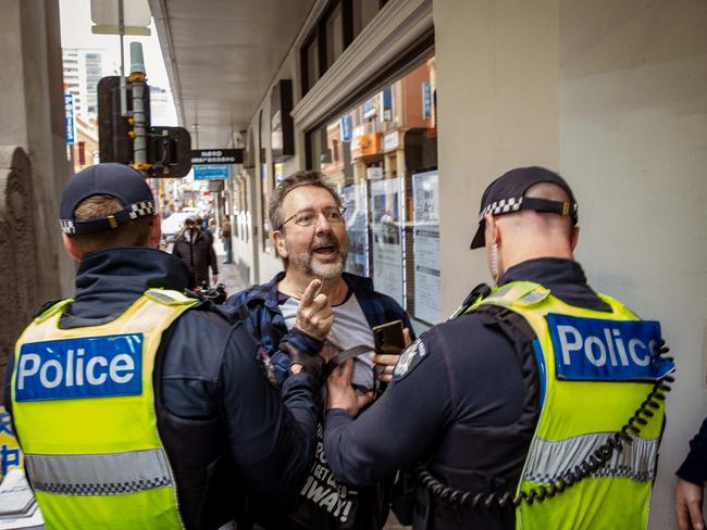 A man is restrained by police during the anti-Israel rally in Melbourne. Picture: NewsWire