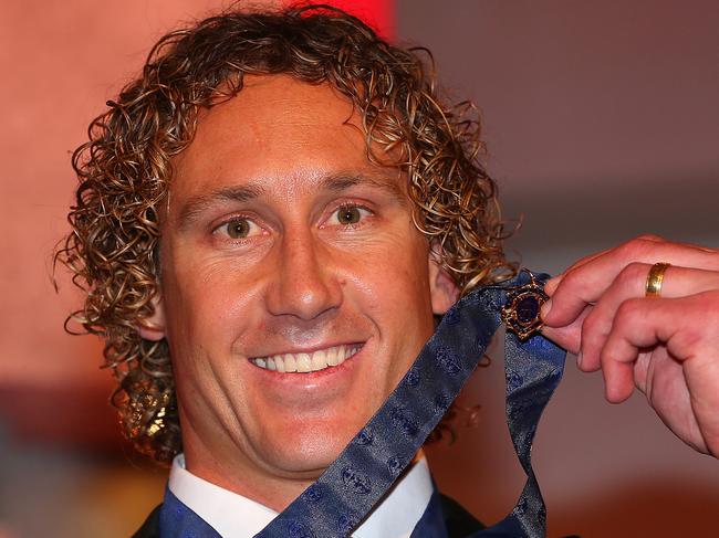 MELBOURNE, AUSTRALIA - SEPTEMBER 22: Matt Priddis of the West Coast Eagles poses with the 2014 Brownlow Medal at the 2014 Brownlow Medal Dinner at Crown Palladium on September 22, 2014 in Melbourne, Australia. (Photo by Quinn Rooney/Getty Images)