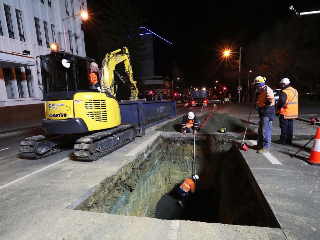 Work in Macquarie Street Hobart on the hole that will house the chamber performance artist Mike Parr will live in for 72 hours during Dark Mofo. Picture: NIKKI DAVIS-JONES