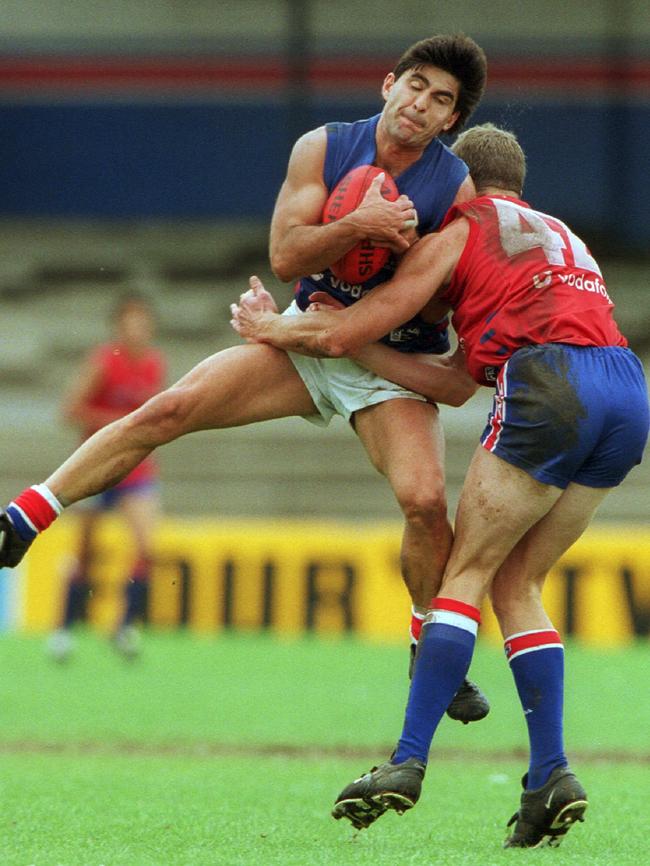 David Sheahan (right) tackles Jose Romero in a Western Bulldogs intra club match at Whitten Oval.