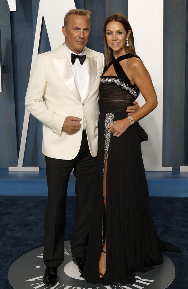 Kevin Costner and Christine Baumgartner attend the 2022 Vanity Fair Oscar Party in Beverly Hills, California. Picture: Frazer Harrison/Getty Images