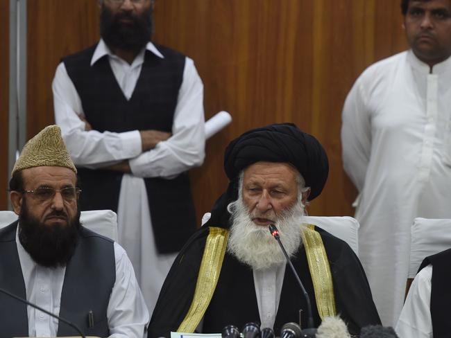 Council of Islamic Ideology chairman Maulana Muhammad Khan Sherani (right) addresses a press conference in Islamabad. Picture: AFP/Farooq Naeem