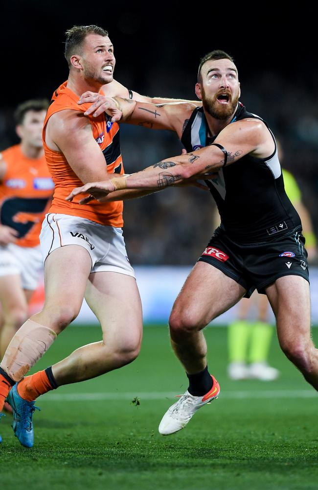 Charlie Dixon in the ruck against Giant Kieren Briggs during the semi-final loss. Picture: Mark Brake/Getty Images