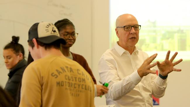 Victoria University vice-chancellor Peter Dawkins teaching a small-sized, interactive class in block mode before the COVID-19 lockdown. Picture Stuart McEvoy