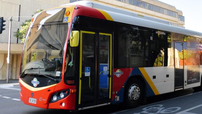 An Adelaide metro bus is seen driving down Angas Street in Adelaide, Monday, April 2, 2018. (AAP Image/Morgan Sette) NO ARCHIVING