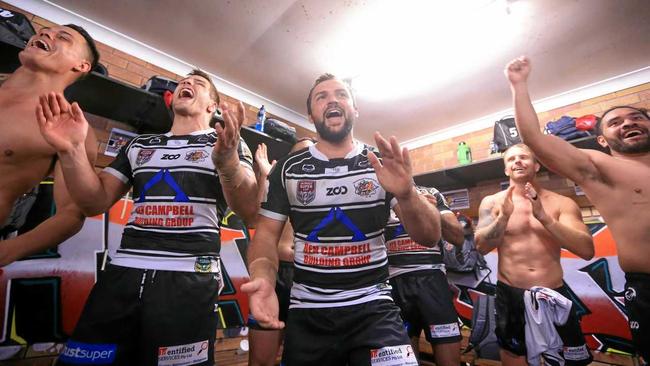 ROUSING RENDITION: Seagulls captain Cheyne Whitelaw belts out the team song alongside Sam Meskell after an incredible comeback vs Ipswich. Picture: SMP IMages