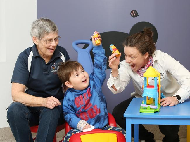 DoSomething Day 2017.:Volunteer Jenny Cooper,patient 2yo Jude Barns and family room co ordinator Kami Dibden at Ronald McDonald Family Room at Gosford Hospital relies on volunteers to ensure it operates successfully.pic Sue Graham