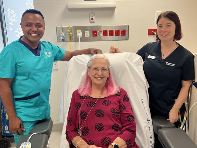 Pauline Walker (centre) with hospital staff.