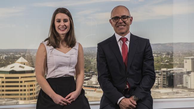 HWL Ebsworth partner Jamie Restas with graduate Stephanie Kolaczkos. Picture SIMON CROSS