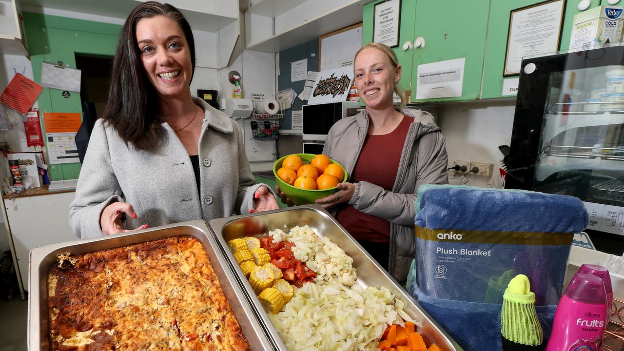 The Outpost vice-president Amy Flint and volunteer Asia Pogue. Picture: Mike Dugdale.