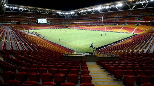 The Broncos and Rabbitohs playing at n empty Suncorp Stadium. Photo: Adam Head