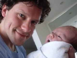 Matthew Roberts with his baby.