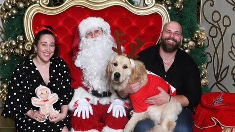 Cristina Tridente and Petar Filipovic with Father Christmas and their fur baby Hercules. Picture: Supplied