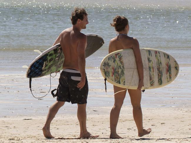 NWNAUSPeople still heading to the beach amidst the Coronavirus crisis. Most people were keeping their distance and being there for exercise, however there were others sun baking .Photographed at Currumbin Alley, Gold Coast, Qld. Photography @Russell Shakespeare