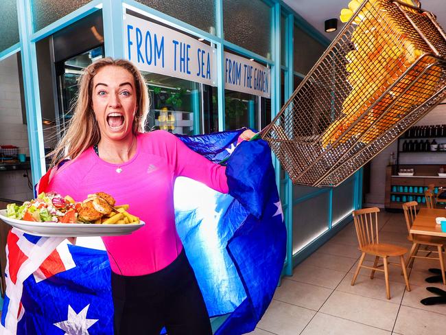 Gold Coast teen Ellie Beer has been selected in the women's 4x400m athletics relay team. It will be her first Olympics. She found out about her selection while working at the local fish n chip shop called HHunky Dory in Palm Beach - her dad called her with the news.Picture: NIGEL HALLETT