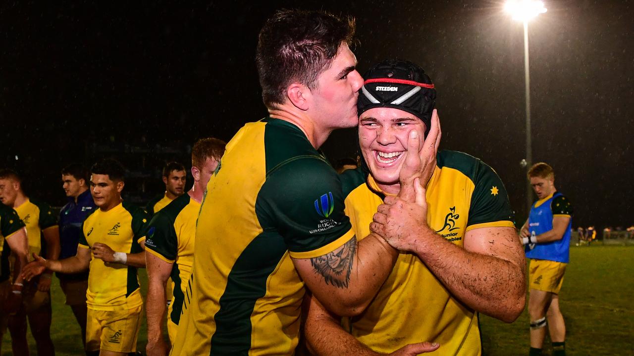 Michael Wood of Australia celebrates with Carlo Tizzano at fulltime. Photo: Stuart Walmsley/Rugby AU Media