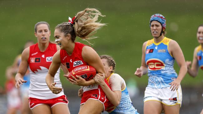 Sydney's Bridie Kennedy tackled by Gold Coast Kalinda Howarth. Picture: Phil Hillyard