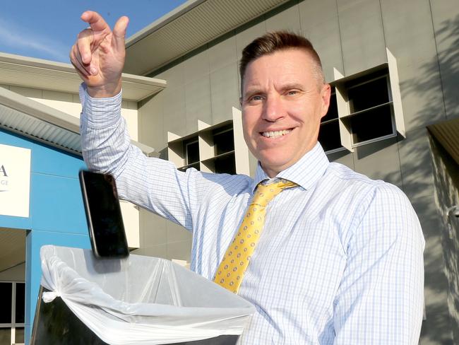 Pimpama State Secondary College principal John Thornberry has implemented a full mobile phone ban in classrooms in an attempt to stamp out cyberbullying. Picture Mike Batterham