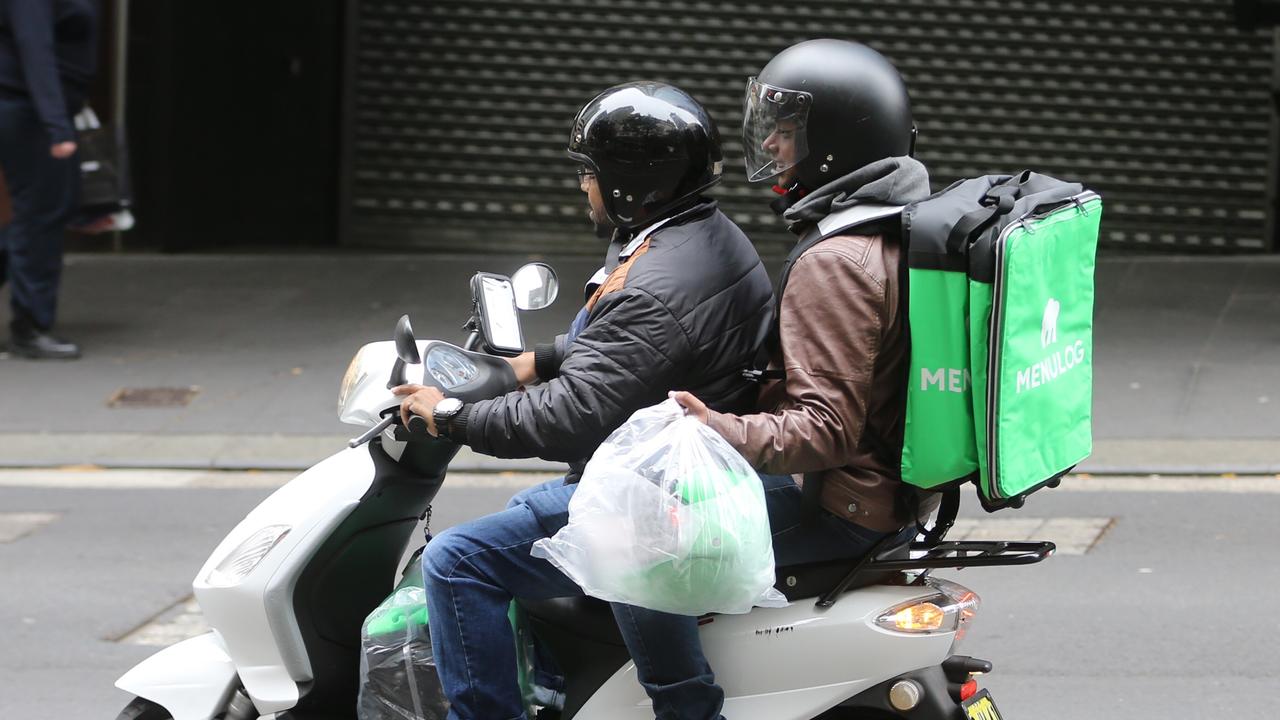 Deliveroo, Menulog, Uber Eats drivers failing to wear helmets properly ...