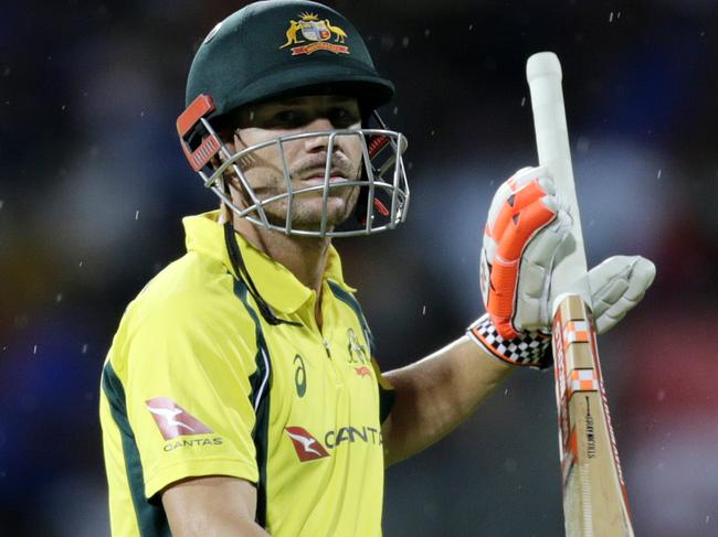 Australia cricket player David Warner leaves the field as play is stopped due to rain, during the first one-day international cricket match between India and Australia in Chennai, India, Sunday, Sept. 17, 2017. (AP Photo/Rajanish Kakade)