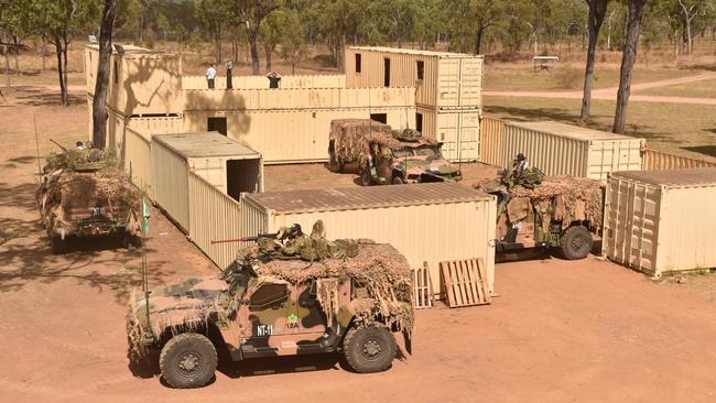 US Marines in conjunction with Australian soldiers from Battle Group Eagle comprising of elements of 3rd Brigade conduct an urban clearance of a fictitious invading force at the Townsville Filed Training Area. Defenders from an invading fictitious force at the Urban Operations Training Facility. Picture: Evan Morgan