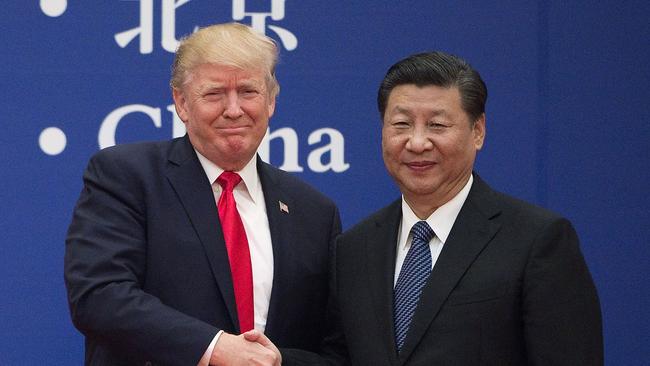 US President-elect Donald Trump with his Chinese counterpark in 2020. In the months and years ahead, there is a significant chance of a US-China military crisis in Asia. Picture: AFP