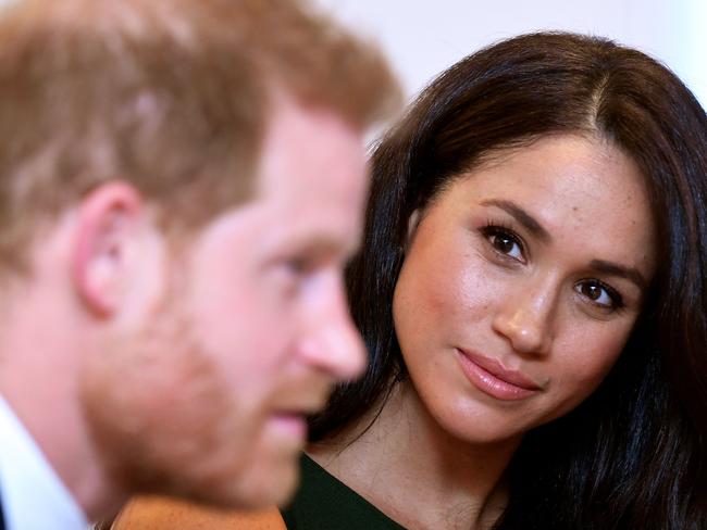 (FILES) In this file photo taken on October 15, 2019 Britain's Prince Harry, Duke of Sussex, and Britain's Meghan, Duchess of Sussex attend the annual WellChild Awards in London on October 15, 2019. - Prince Harry's wife Meghan will make an instant start to life away from Britain's royal frontline by narrating a new film about a family of African elephants, Disney announced on Thursday. (Photo by TOBY MELVILLE / POOL / AFP)