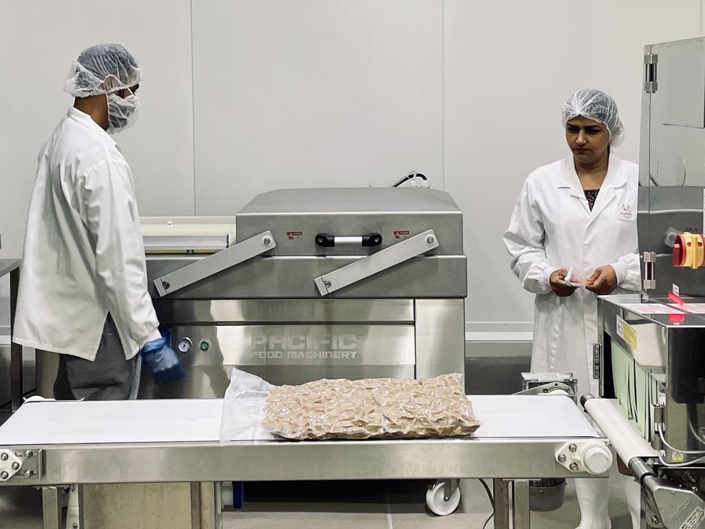 Workers at the Proform Foods facility.