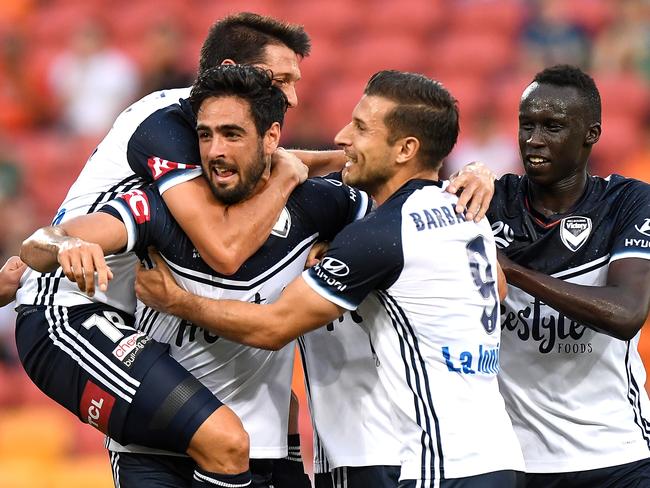 BRISBANE, AUSTRALIA - DECEMBER 17:  Rhys Williams of the Victory celebrates scoring a goal during the round 11 A-League match between the Brisbane Roar and the Melbourne Victory at Suncorp Stadium on December 17, 2017 in Brisbane, Australia.  (Photo by Bradley Kanaris/Getty Images)