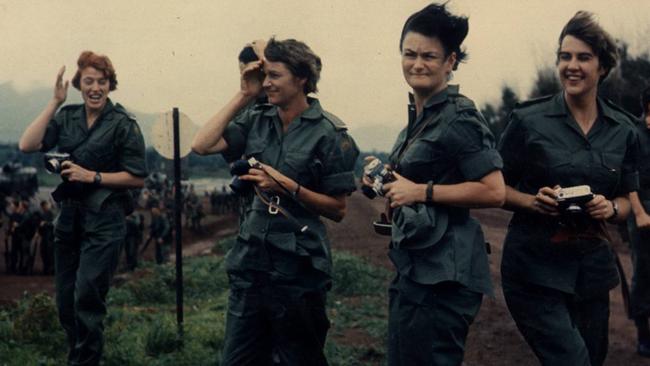 The “Fab Four” – Lieutenant Colleen Mealy (second from right) with, from left, Lieutenant Margaret Ahern, Captain Amy Pittendreigh and Lieutenant Terrie Roche, watch 2 RAR leave on a heliborn assault.