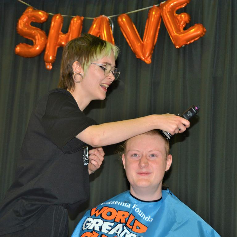 At the St Joseph's College 2023 World's Greatest Shave event is Angus Deacon getting his hair cut by Caitlin Symes from the Hair Room on Russell. Picture: Rhylea Millar