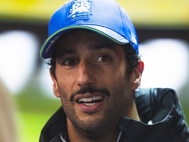 SPA, BELGIUM - JULY 27: 13th placed qualifier Daniel Ricciardo of Australia and Visa Cash App RB talks to the media during qualifying ahead of the F1 Grand Prix of Belgium at Circuit de Spa-Francorchamps on July 27, 2024 in Spa, Belgium. (Photo by Rudy Carezzevoli/Getty Images)