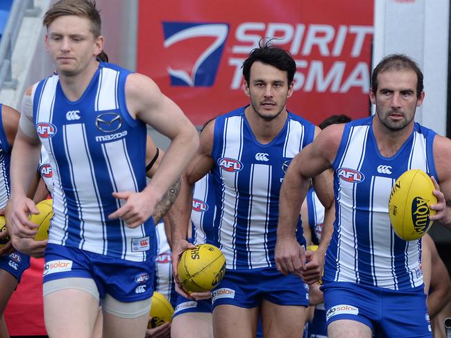 HOBART, AUSTRALIA - JUNE 13: Jack Ziebell of the Kangaroos leads out the team during the round 13 AFL match between the North Melbourne Kangaroos and the Greater Western Sydney Giants at Blundstone Arena on June 13, 2021 in Hobart, Australia. (Photo by Steve Bell/Getty Images)