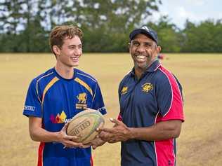 NEW COACH: Downlands College rugby player Michael Van Rooyen (left) chats with new kicking and backs coach former Wallaby Andrew Walker. Picture: Kevin Farmer