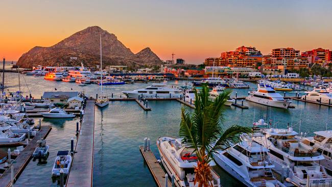 The stunning Cabo San Lucas Marina at sunset.