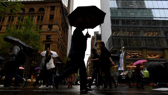 Commuters will be wishing they packed an umbrella when they leave work this afternoon. Picture: AAP Image/Mick Tsikas